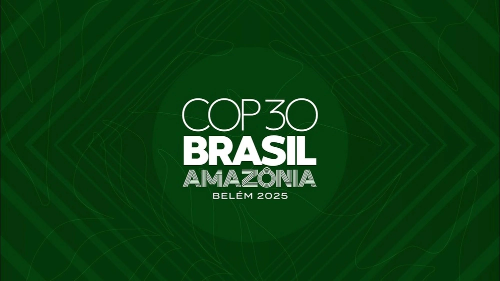 A banner image for COP30, with text in modern sans serif thin and thick combination of fonts saying "COP30 Brasil, Amazonia Belem 2025". The text is white, centered on a rich dark green background with a goemetric pattern overlay paired with thin line pattern depicting leaves.